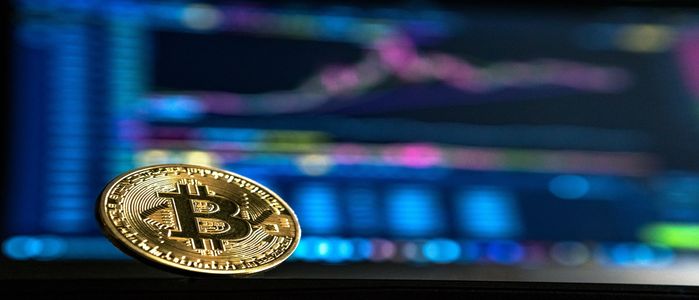 Bitcoin Retrocede Hasta los 22.000 Dólares en Medio de la Esperada Subida de los Tipos de Interés de la FED